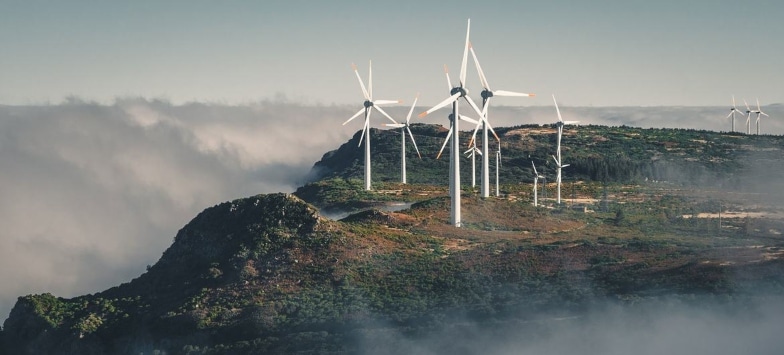 windmills-clouds-landscape