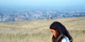 woman with laptop-plains landscape