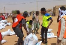 white UN aid bags-four men-Khartoum