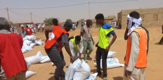 white UN aid bags-four men-Khartoum