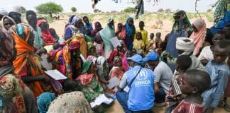 unhcr personnel with locals