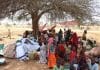 Chad-refugees seek shelter under tree