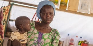 A mother and her baby at Internally Displaced People (IDP) Camp B in Mafa, Borno State, Nigeria.