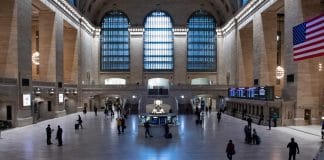 A wide view of Grand Central Terminal with an unusually sparse crowd during the Coronavirus (COVID-19) outbreak in New York City.