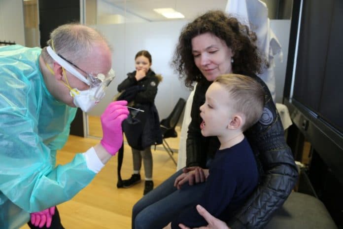 Child being tested in Iceland - Photo: deCode Genetics