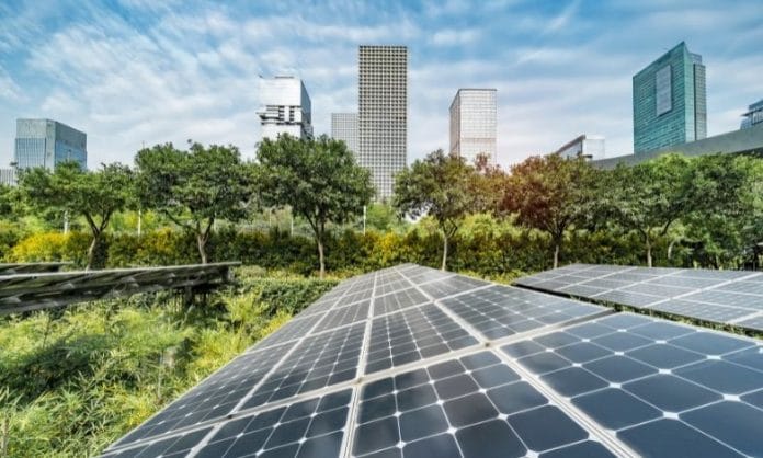 Solar panels and city backdrop, Climate Smart Cities Challenge