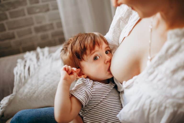 A woman breastfeeding.