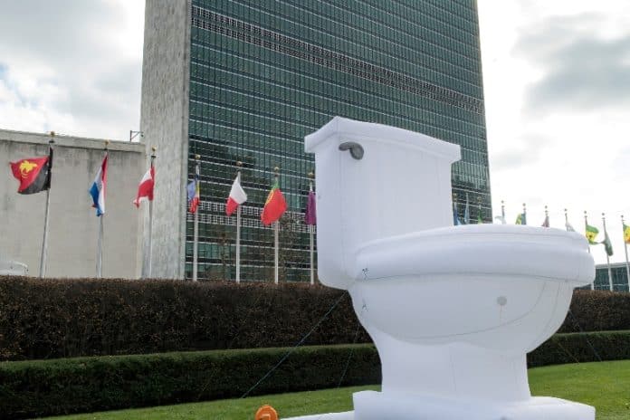 A giant inflatable toilet sits on the front lawn of the UN Headquarters in commemoration of World Toilet Day.