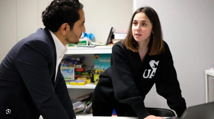 Alina Kokhanko at a Brussels meeting. © UNHCR