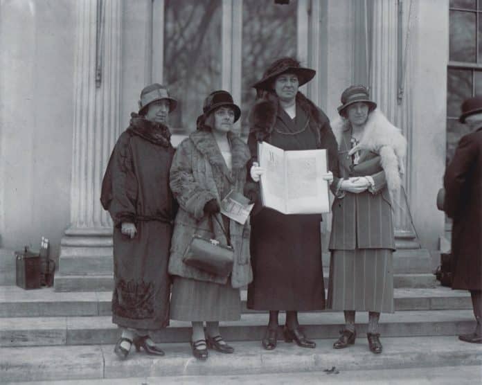 The four women from the Welsh delegation outside the Whitehouse: from left: Gladys Thomas, Mary Ellis, Annie Hughes Griffiths, and Elined Prys.