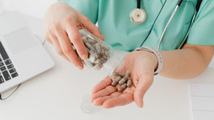 Nurse sorting antibiotics