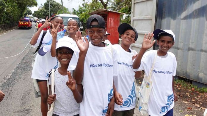 UNDRR and Munich Re Foundation 2025 Risk Awards banner showing children sporitng the #GetToHighGround hashtag