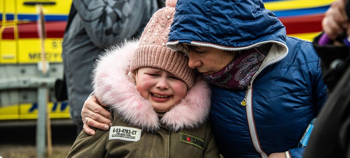 Fjölskylda komin yfir landamæri Póllands í Berdyszcze