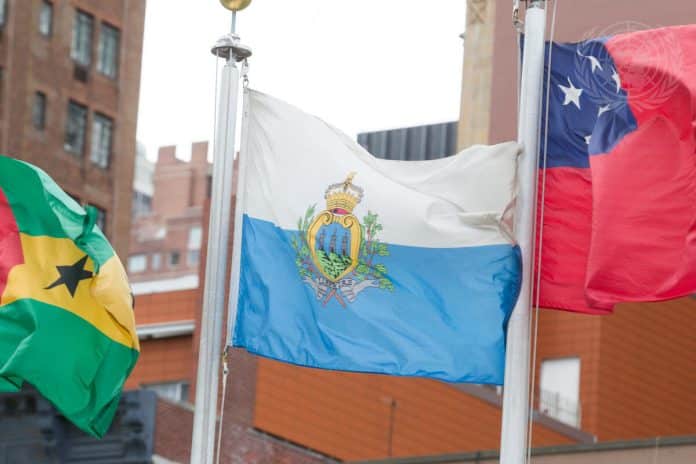 The flag of the Republic of San Marino (centre) flying at UN headquarters in New York.