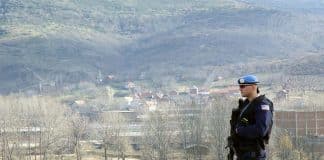 In this picture, a United Nations peacekeeping soldier on guard near Belgrade