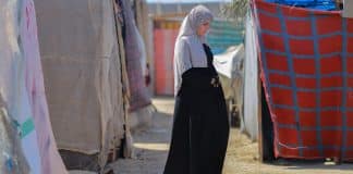 A pregnant displaced woman lives in a tent inside the Deir al-Balah camps. Credits: UNFPA