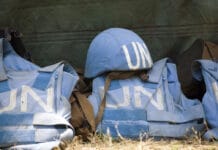 blue helmets and vests